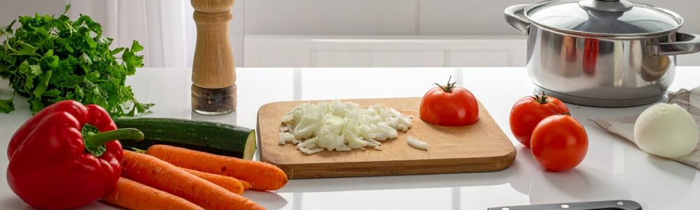 cooking ingredients, knife, cutting board, pot